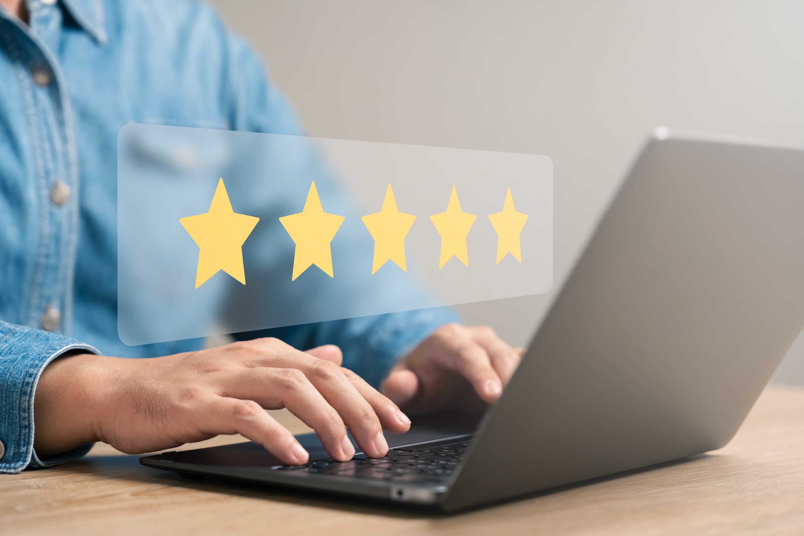 customer satisfaction survey concept business people use laptops Touch the happy smiley icon. Satisfied. 5 stars. Service experience rating. online application Satisfaction Review best quality.